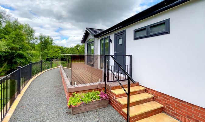 Luxury Cosgrove residential park home for sale in Wales. Exterior photo