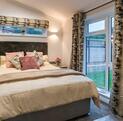 Kingston Tranquility Lodge at Rockbridge Park - main bedroom photo