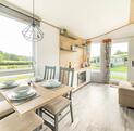 Atlas Style caravan holiday home for sale on 5 star caravan park in Wales - living area photo